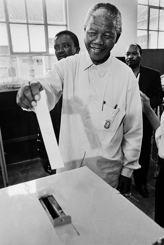 Nelson Mandela casting his vote in South Africa's first democratic election, 1994